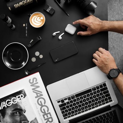 pexels-photo-3568520 Top View of Assorted Gadgets on Desk